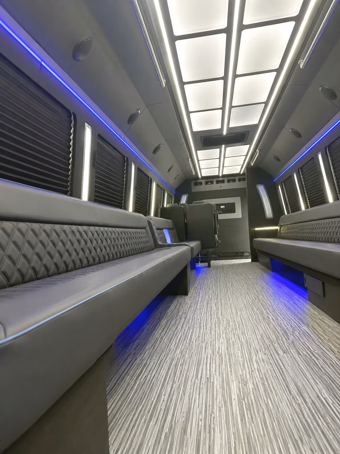 Passenger seating aboard a party bus rental serving Denver